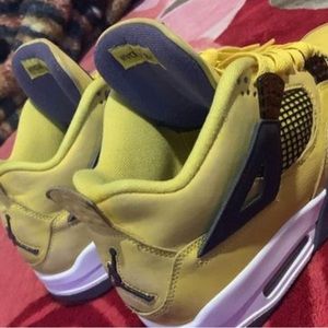 I am selling a. Jordan 4 lightning Size 10 yellow comfortable sneakers to wear.